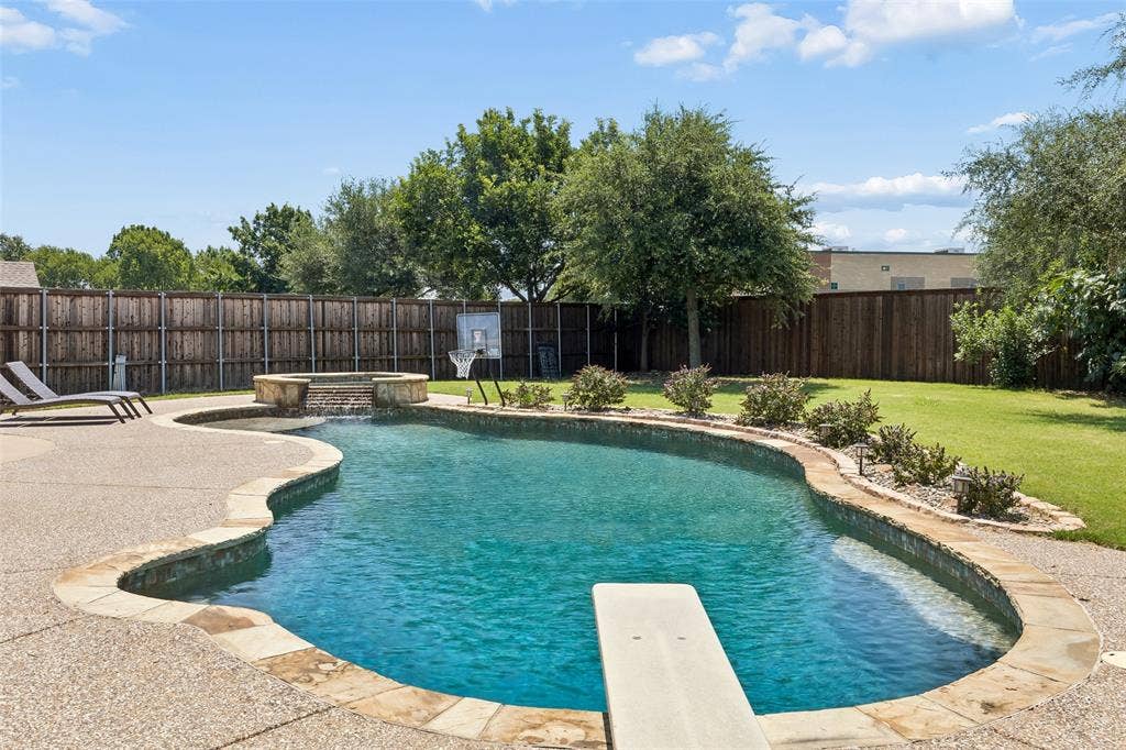 5732 Chateau Drive, Sachse, TX 75048 Massive pool view from the diving board side.