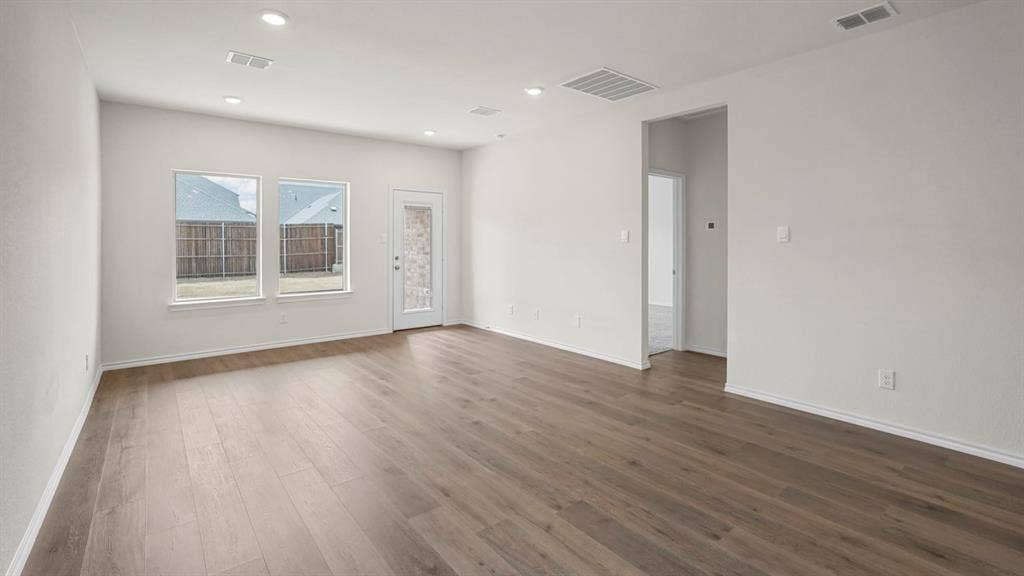 1671 Blaire Drive, Tyler, TX 75702 Wood-finish flooring throughout, recessed lighting, and a white interior paint scheme