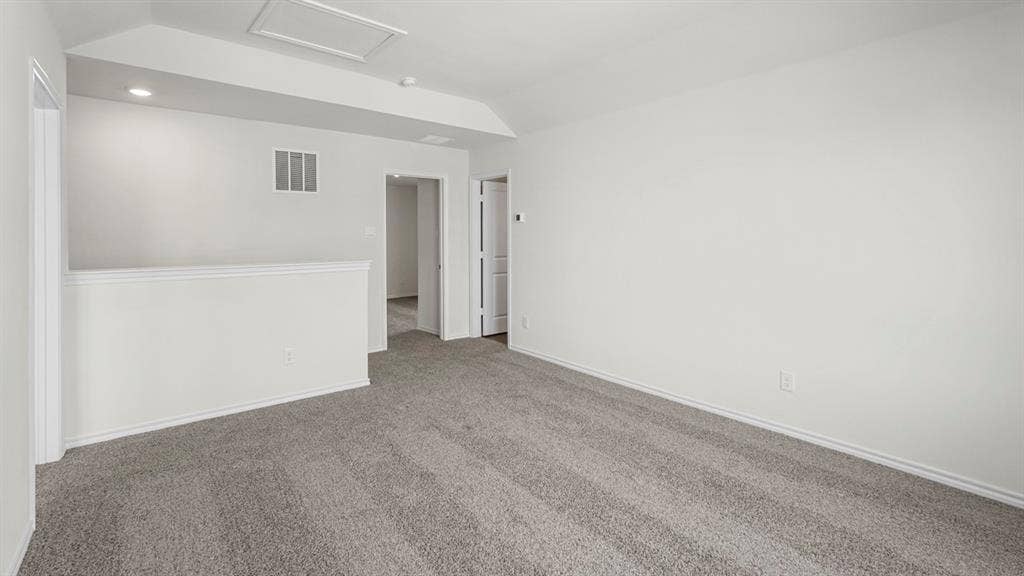 1671 Blaire Drive, Tyler, TX 75702 Recessed lighting, light gray carpet, white painted walls, white trim, and a white interior door