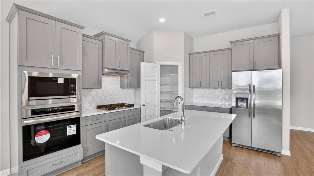 Kitchen - All Home and community information, including pricing, included features, terms, availability and amenities, are subject to change at any time without notice or obligation. All Drawings, pictures, photographs, video, square footages, floor plans, elevations, features, colors and sizes are approximate for illustration purposes only and will vary from the homes as built.