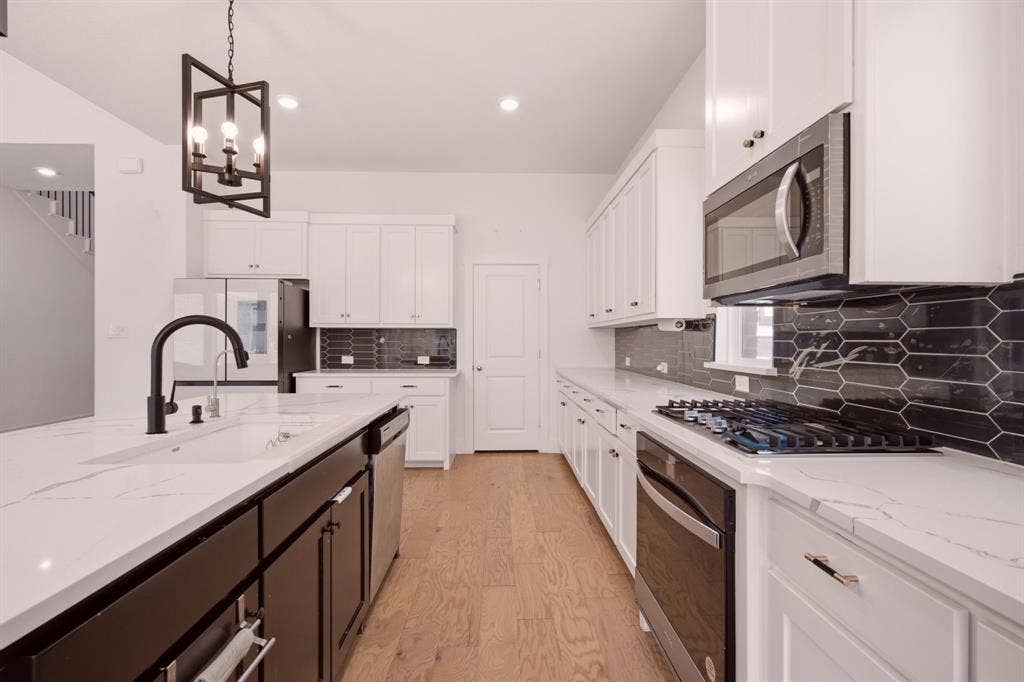1305 Honey Locust Way, Celina, TX 75009 Large kitchen is the center of this home