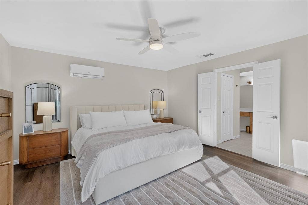 17335 Remington Park Place, Dallas, TX 75252 Wood-finish flooring, ceiling fan, split air conditioning unit, and double-door entry