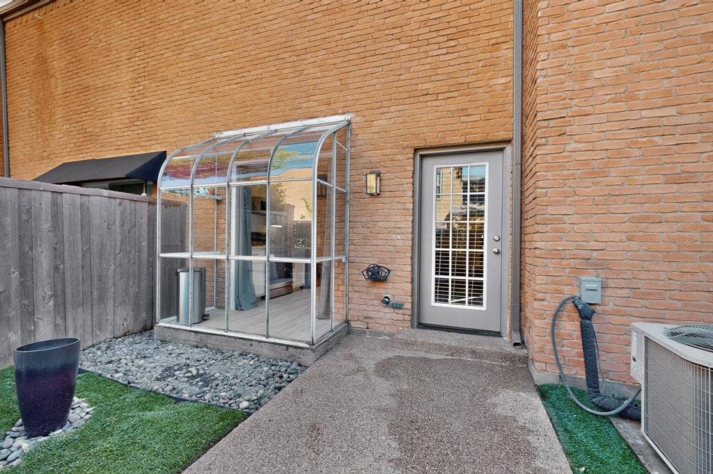 17335 Remington Park Place, Dallas, TX 75252 Brick exterior with a glass-paneled entry door