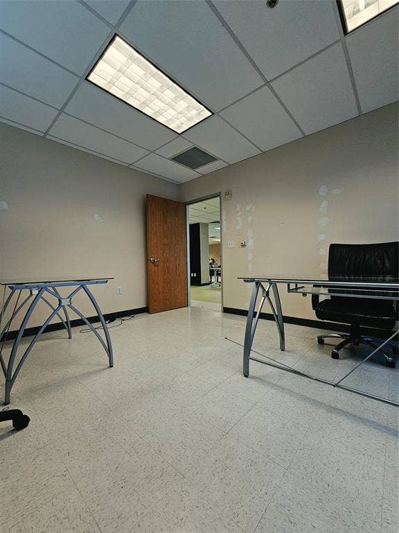 1675 Republic Parkway, #140, Mesquite, TX 75150 Recessed fluorescent lighting, acoustical tile ceiling, wood-finish door, and light-toned resilient flooring