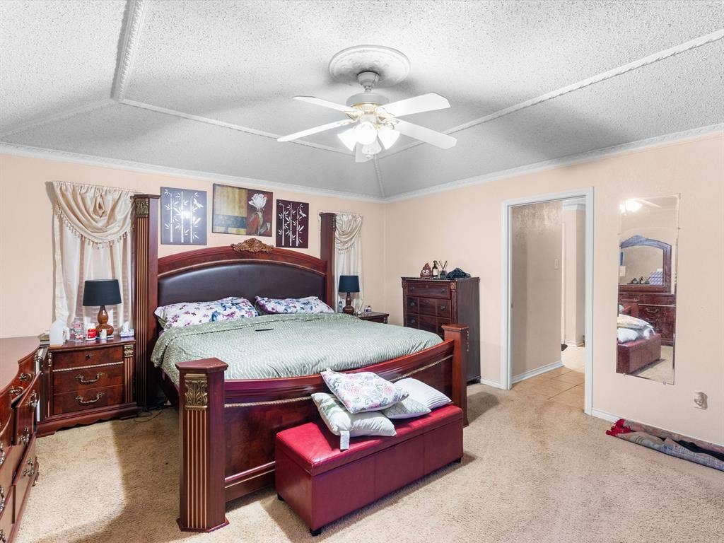 5818 Winding Woods Trail, Dallas, TX 75227 Primary bedroom with decorative trim