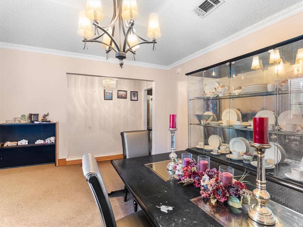 5818 Winding Woods Trail, Dallas, TX 75227 Ornate chandelier, decorative crown molding