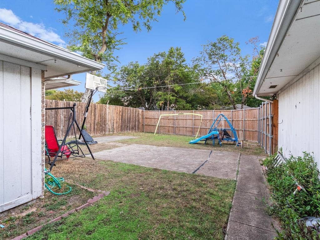 5818 Winding Woods Trail, Dallas, TX 75227 Backyard featuring a privacy fence, and concrete patio