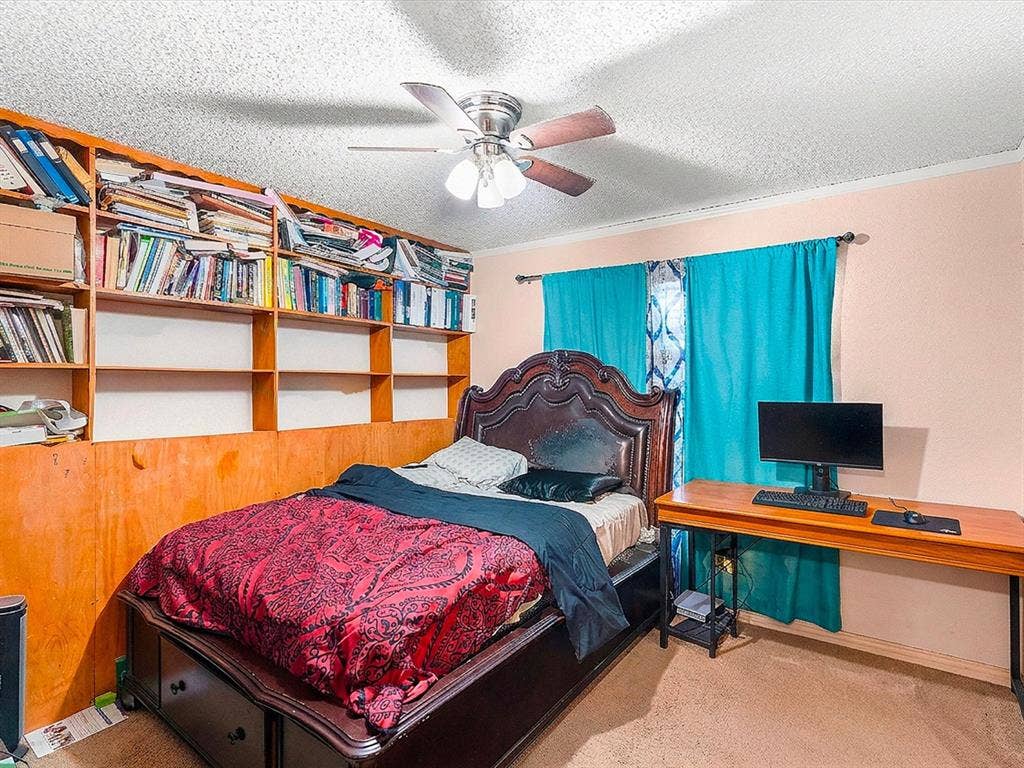 5818 Winding Woods Trail, Dallas, TX 75227 Built-in shelving, ceiling fan, carpet flooring