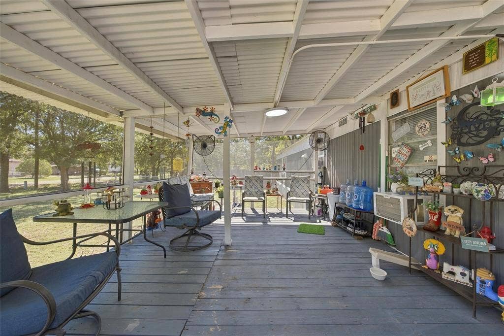 365 Beaver Lane, Waco, TX 76705 Screened porch with a metal roof and painted wood-finish flooring