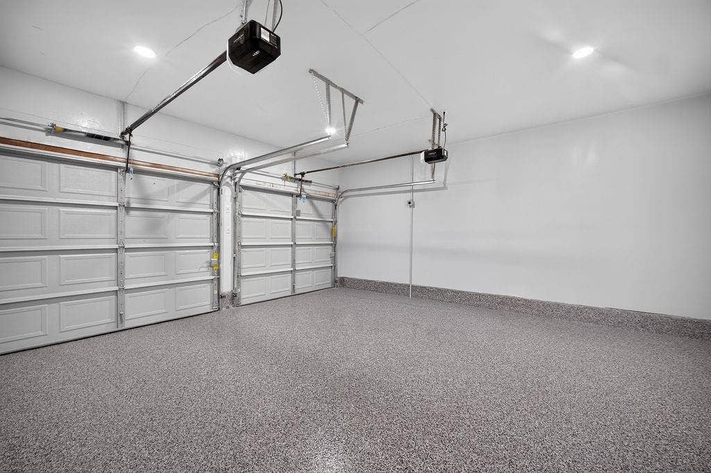 9112 Clearwater Drive, Dallas, TX 75243 Two garage doors with automatic openers
