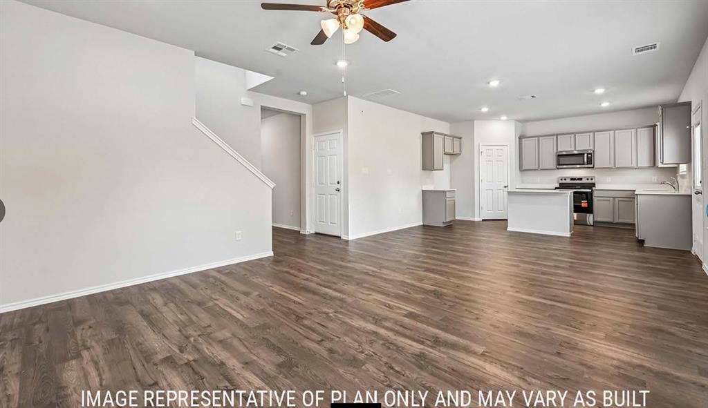 10408 Altair Drive, Waco, TX 76708 Open-concept living space with wood-finish flooring, recessed lighting, and a ceiling fan
