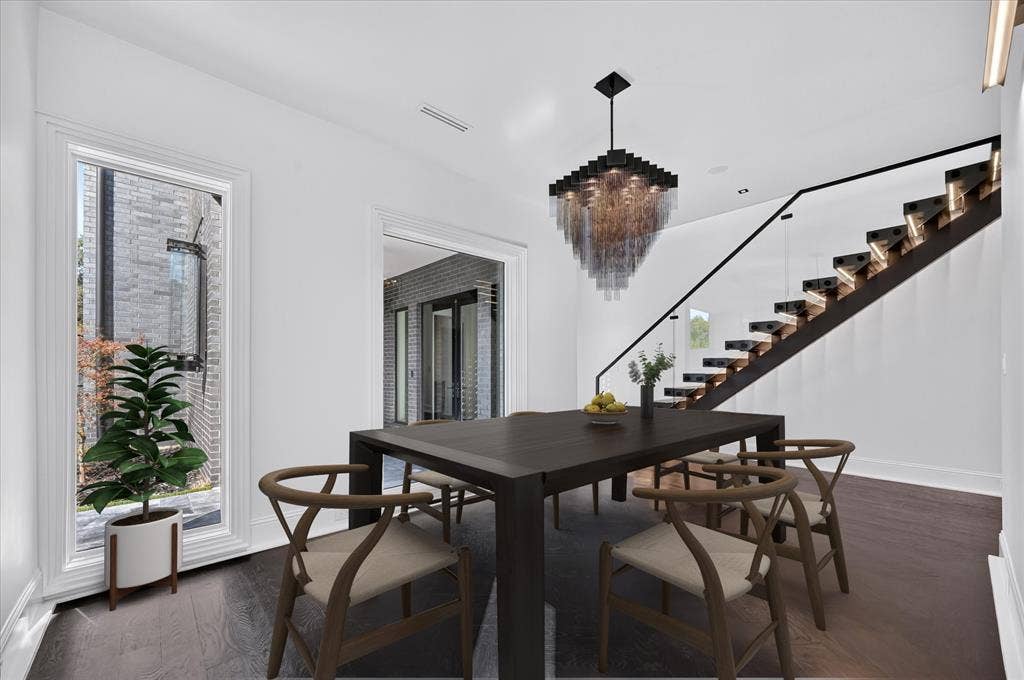 6404 Lakehurst Avenue, Dallas, TX 75230 Dark wood-finish flooring with a modern floating staircase featuring glass railings