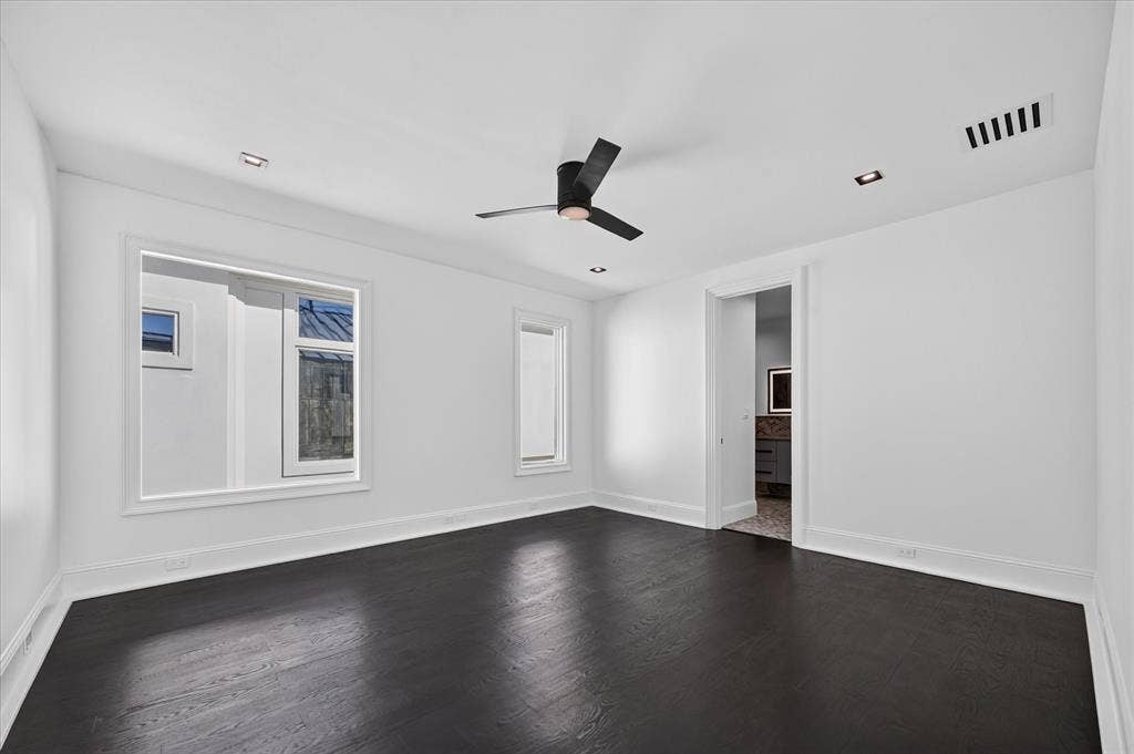 6404 Lakehurst Avenue, Dallas, TX 75230 Dark wood-finish flooring with white walls