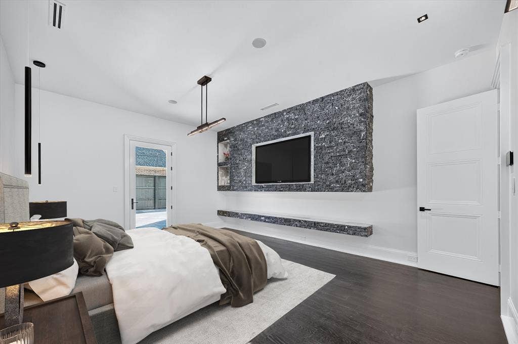 6404 Lakehurst Avenue, Dallas, TX 75230 Accent wall featuring stacked stone and integrated shelving