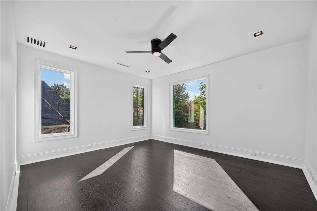 6404 Lakehurst Avenue, Dallas, TX 75230 Dark wood-finish flooring with white baseboards
