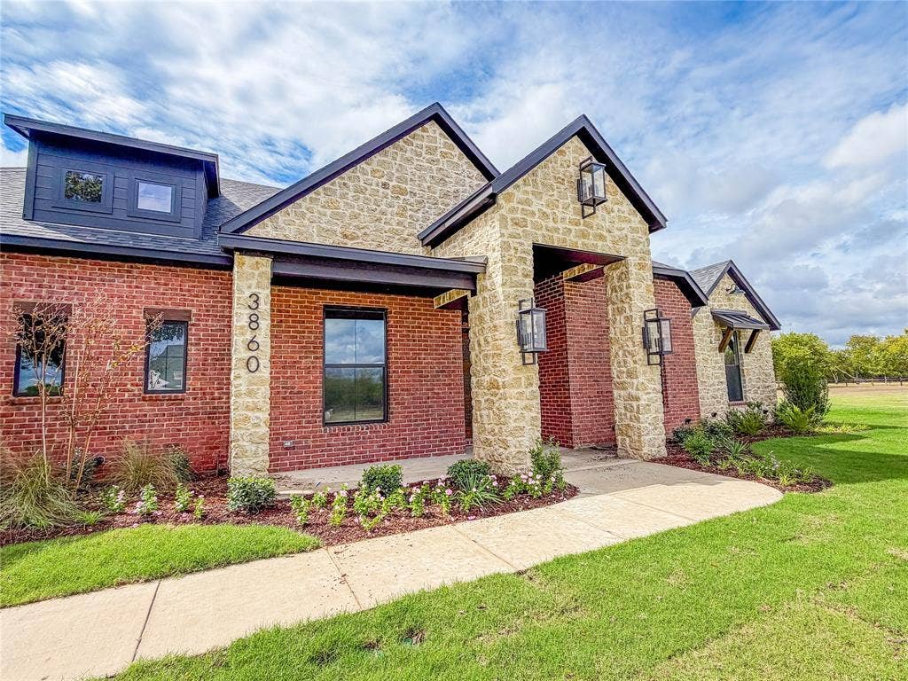3860 Jacks Loop, Midlothian, TX 76065 Brick and stone exterior with black-framed windows