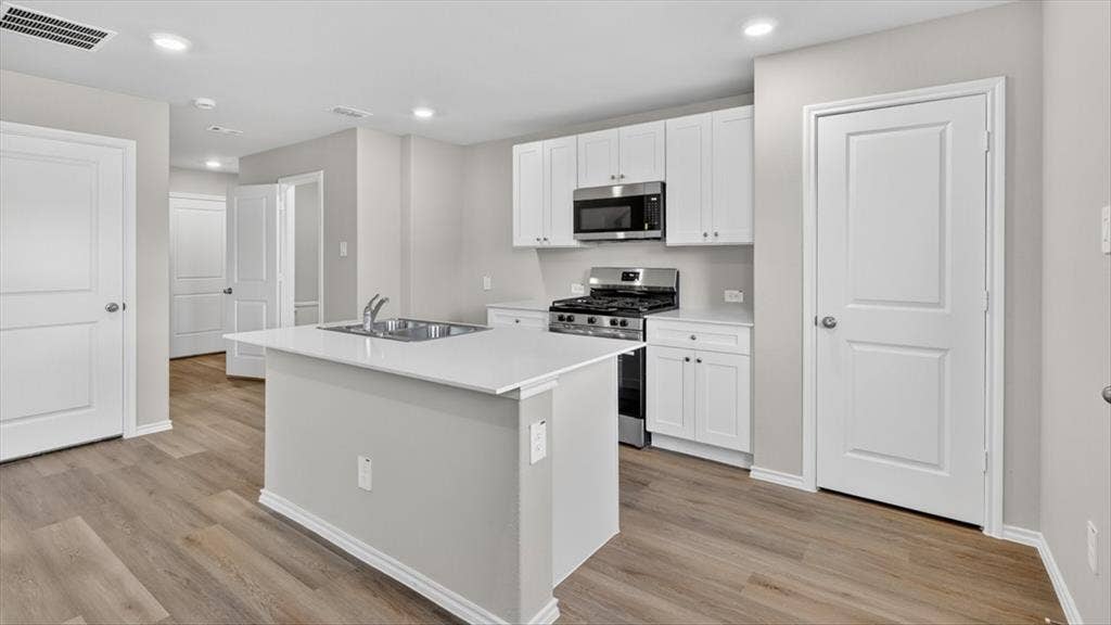 Kitchen-All Home and community information, including pricing, included features, terms, availability and amenities, are subject to change at any time without notice or obligation. All Drawings, pictures, photographs, video, square footages, floor plans, elevations, features, colors and sizes are approximate for illustration purposes only and will vary from the homes as built.