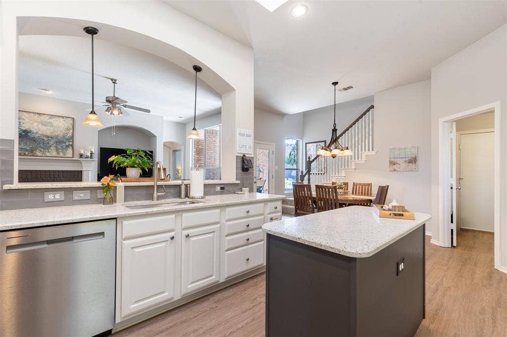 Kitchen with eat-in bar top.