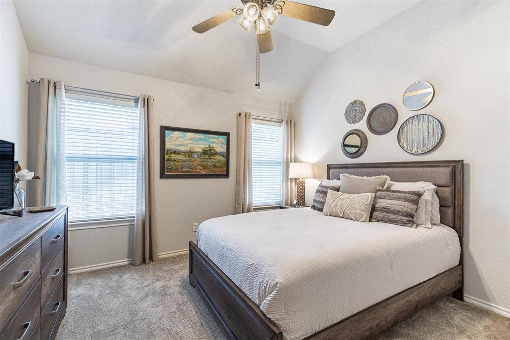 Secondary downstairs bedroom with natural light.