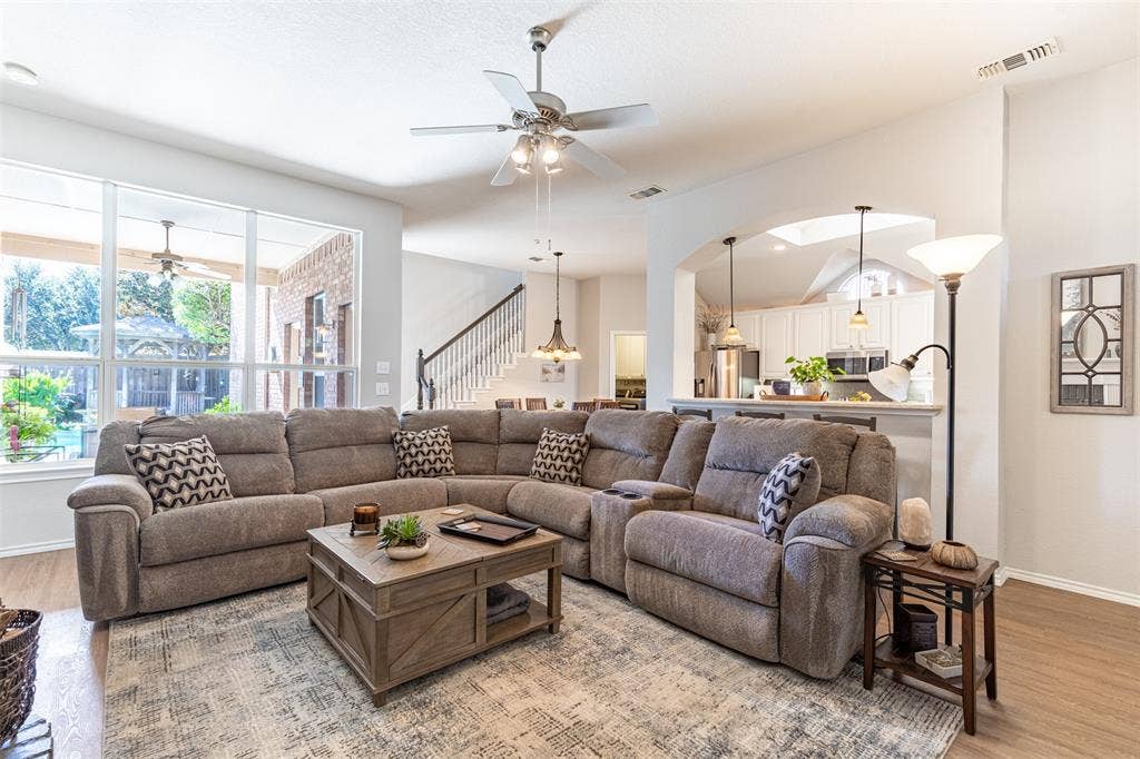 Living room flows seamlessly to kitchen and breakfast room.