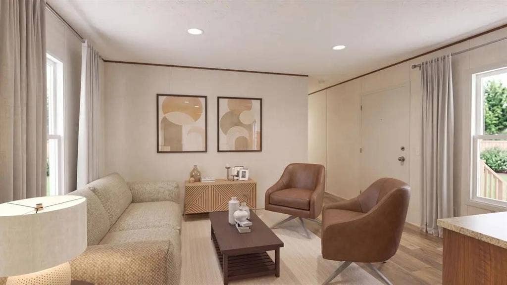 216 W Acres Road, Gun Barrel City, TX 75156 Open concept living area featuring recessed lighting, wood-finish flooring, and multiple windows with neutral wall tones