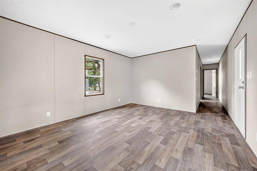 216 W Acres Road, Gun Barrel City, TX 75156 Wood-finish flooring throughout, recessed lighting, and a window with exterior views