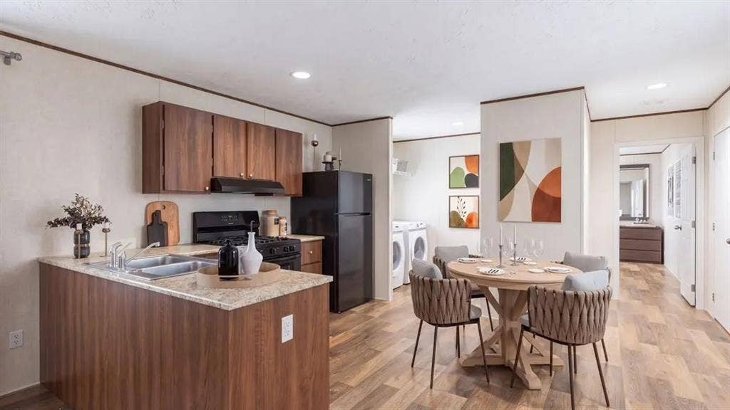 216 W Acres Road, Gun Barrel City, TX 75156 Kitchen featuring a peninsula with composite countertop, wood-finish cabinetry, recessed lighting, and wood-finish flooring