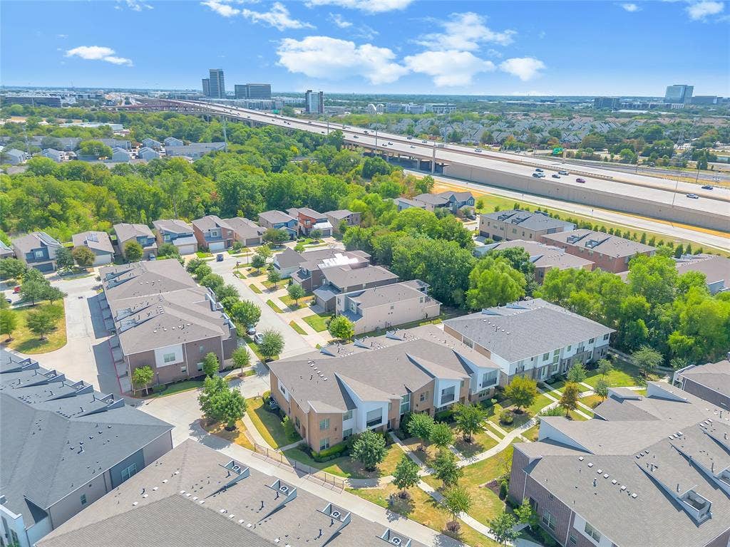 525 Division Street, Plano, TX 75075 Modern residential development with varied architectural styles, dense surrounding tree canopy, and proximity to major roadways