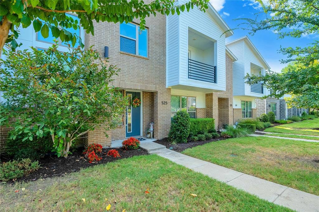 525 Division Street, Plano, TX 75075 Brick and horizontal siding exterior with a dedicated front walk and landscaped entry