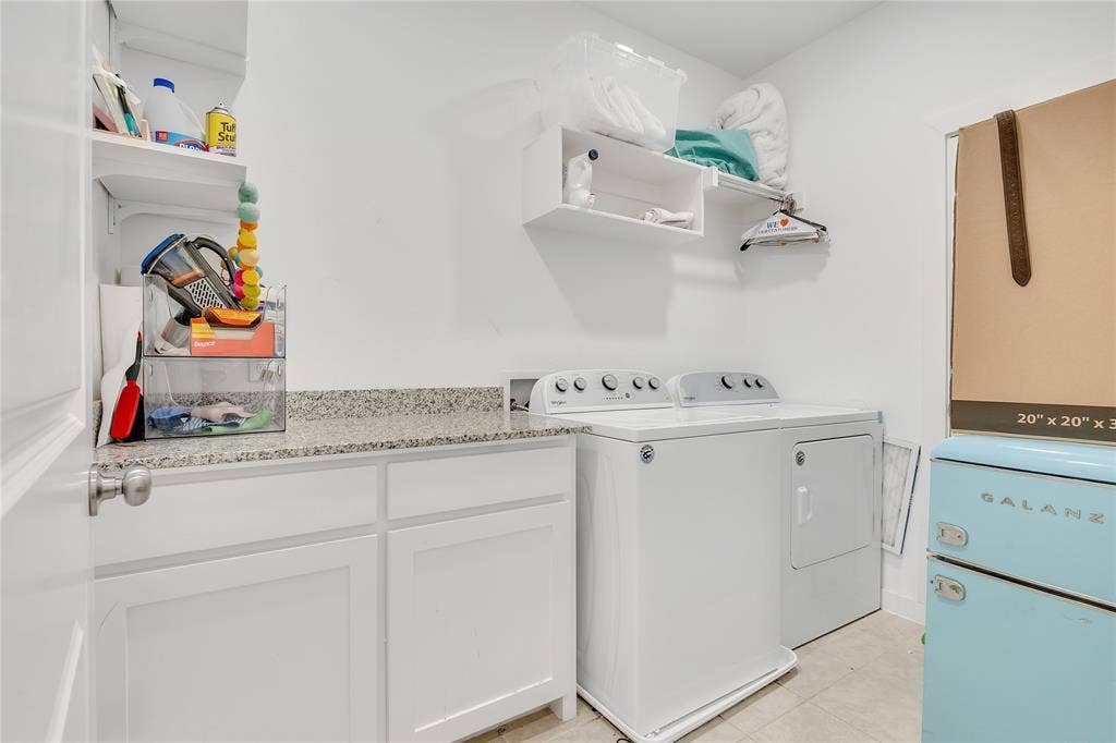 525 Division Street, Plano, TX 75075 Built-in cabinetry with a light-toned countertop, and integrated shelving