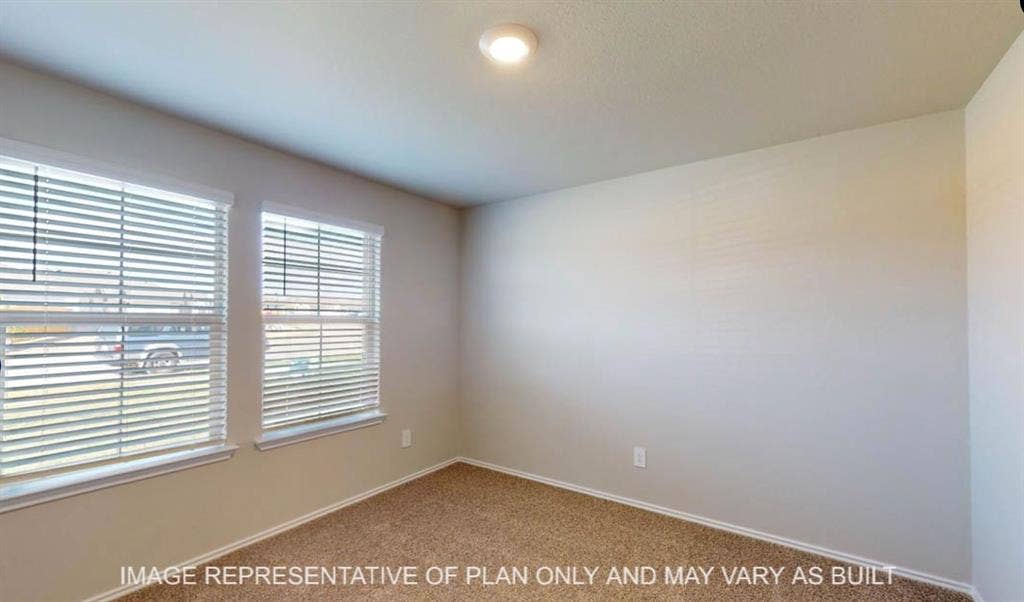 10220 Altair Drive, Waco, TX 76708 Two windows with blinds, recessed ceiling light, and neutral wall paint