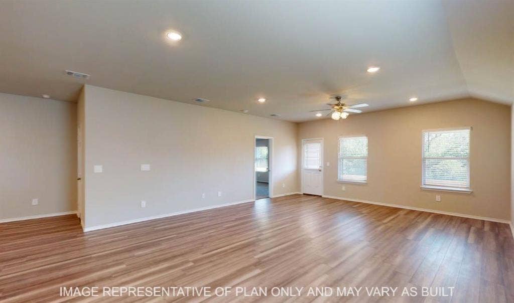 10220 Altair Drive, Waco, TX 76708 Vaulted ceiling, wood-finish flooring, recessed lighting, ceiling fan, and multiple windows