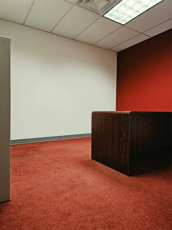 1675 Republic Parkway, #150 and 5 Offices, Mesquite, TX 75150 Red carpeting, white and accent red walls, wood-finish desk, and drop ceiling with recessed lighting