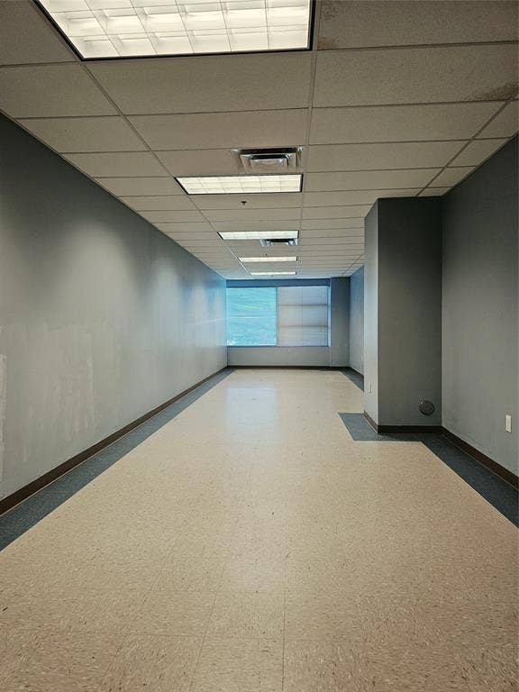 1675 Republic Parkway, #150 and 5 Offices, Mesquite, TX 75150 Suspended acoustical ceiling with integrated fluorescent lighting, light-toned resilient flooring, and horizontal windows providing natural illumination