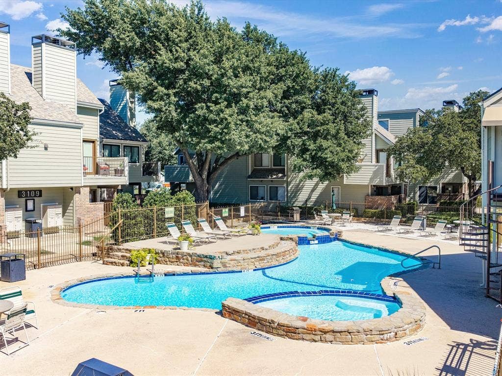 3129 Sondra Drive, #206, Fort Worth, TX 76107 Resort-style pool with integrated spa and stone-clad surround