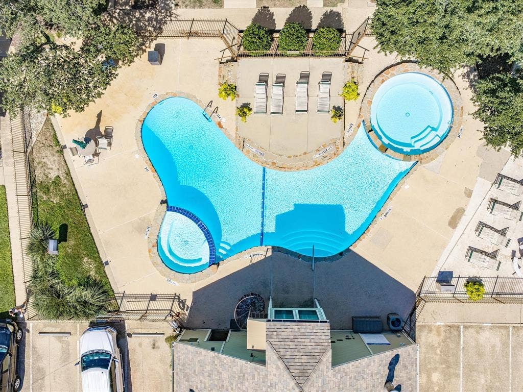 3129 Sondra Drive, #206, Fort Worth, TX 76107 Resort-style pool with integrated spa, expansive concrete decking, and designated lounging areas