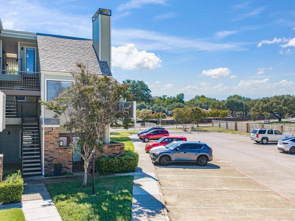 3129 Sondra Drive, #206, Fort Worth, TX 76107 Two-story building with brick and siding exterior