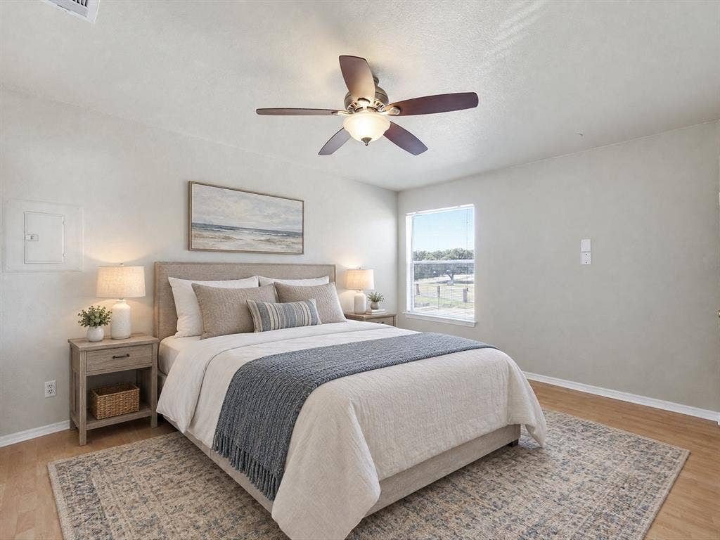 3129 Sondra Drive, #206, Fort Worth, TX 76107 Recessed lighting, ceiling fan with integrated light, wood-finish flooring, and a large window
