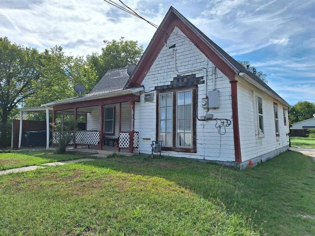 3308 King Street, Greenville, TX 75401 Covered front porch with white lattice railing