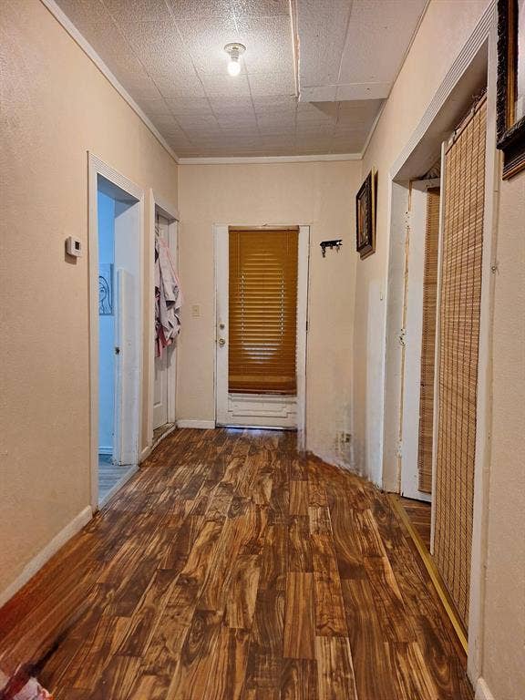 3308 King Street, Greenville, TX 75401 Wood-finish flooring throughout, featuring a neutral color palette and white trim