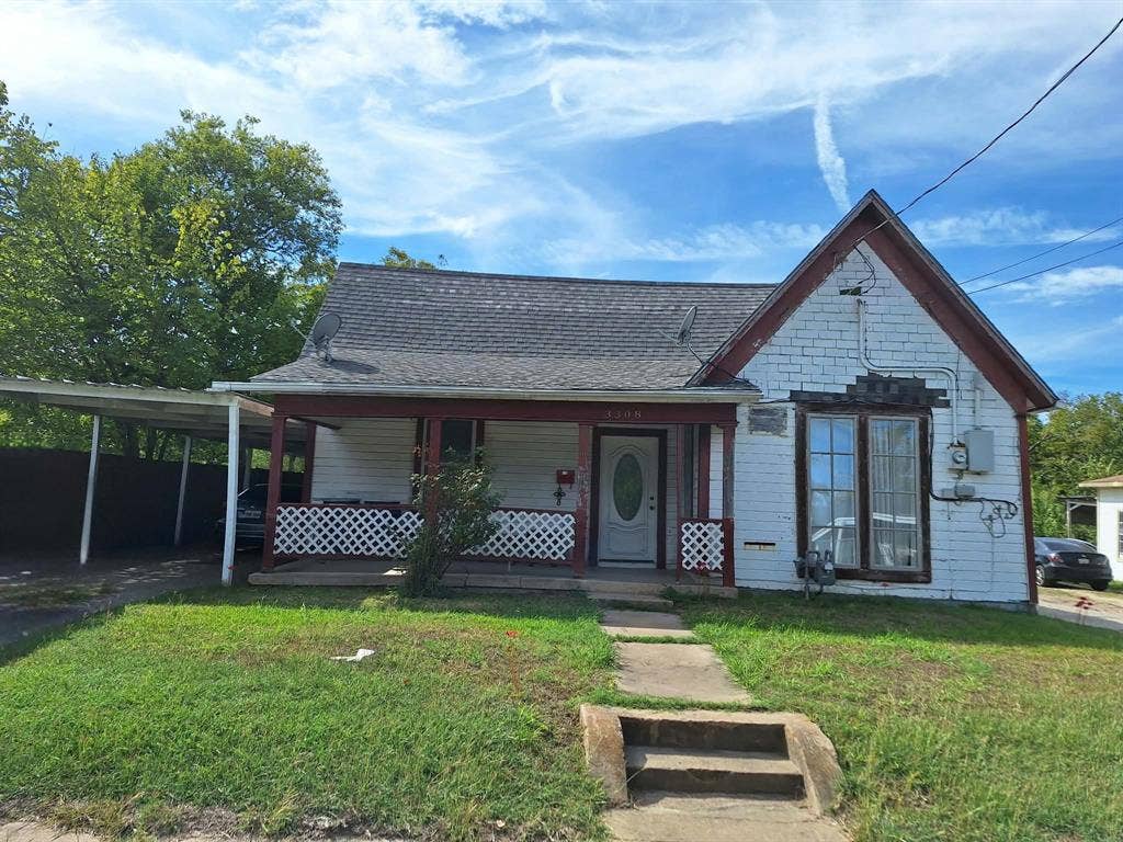 3308 King Street, Greenville, TX 75401 Front exterior featuring a covered porch, white siding, and a gabled roofline