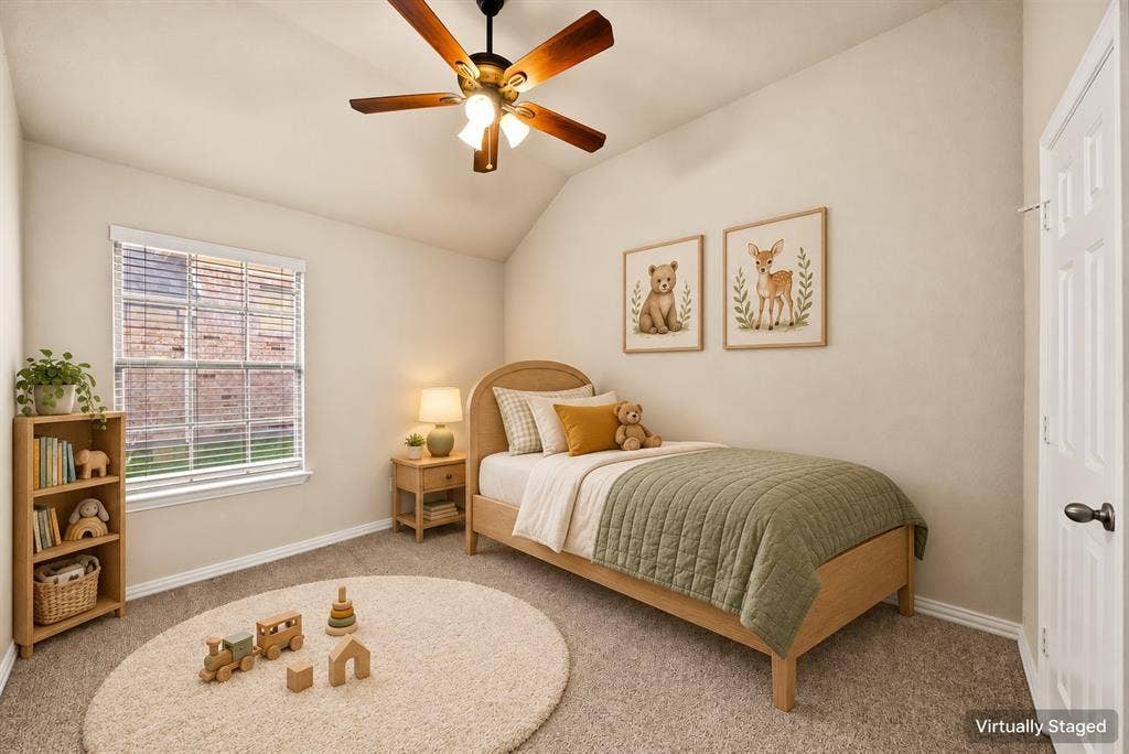 242 Cox Drive, Fate, TX 75087 Vaulted ceiling with a ceiling fan, window with blinds, light-toned walls, and carpet flooring