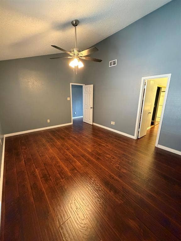2200 W Park Boulevard, #1003, Plano, TX 75075 primary bedroom with ensuite bathroom, ceiling fan & two closets upstairs