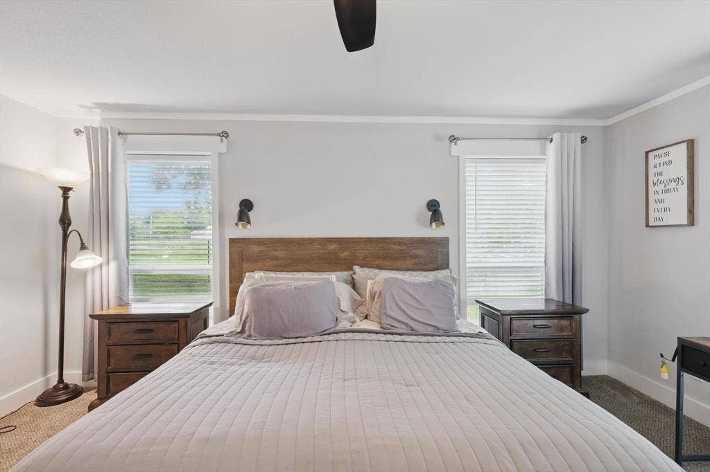5247 Fm 1569, Farmersville, TX 75442 Recessed lighting, wood-finish flooring, two windows with blinds, crown molding, and wall-mounted sconces