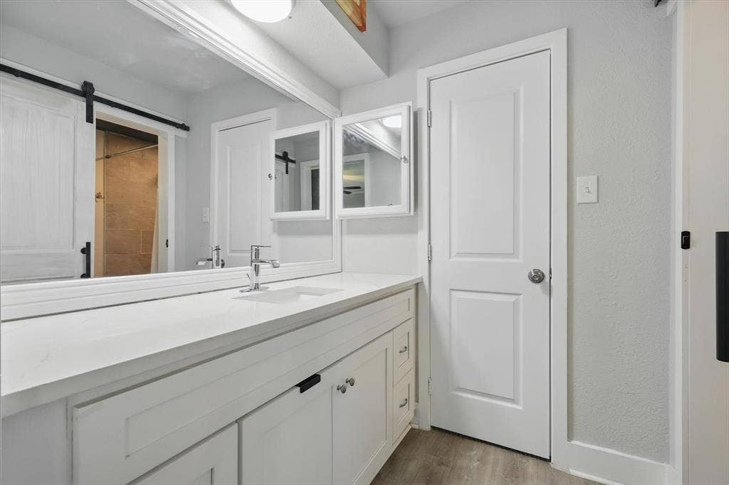 5247 Fm 1569, Farmersville, TX 75442 White vanity featuring a single-basin sink, chrome faucet, and white countertop
