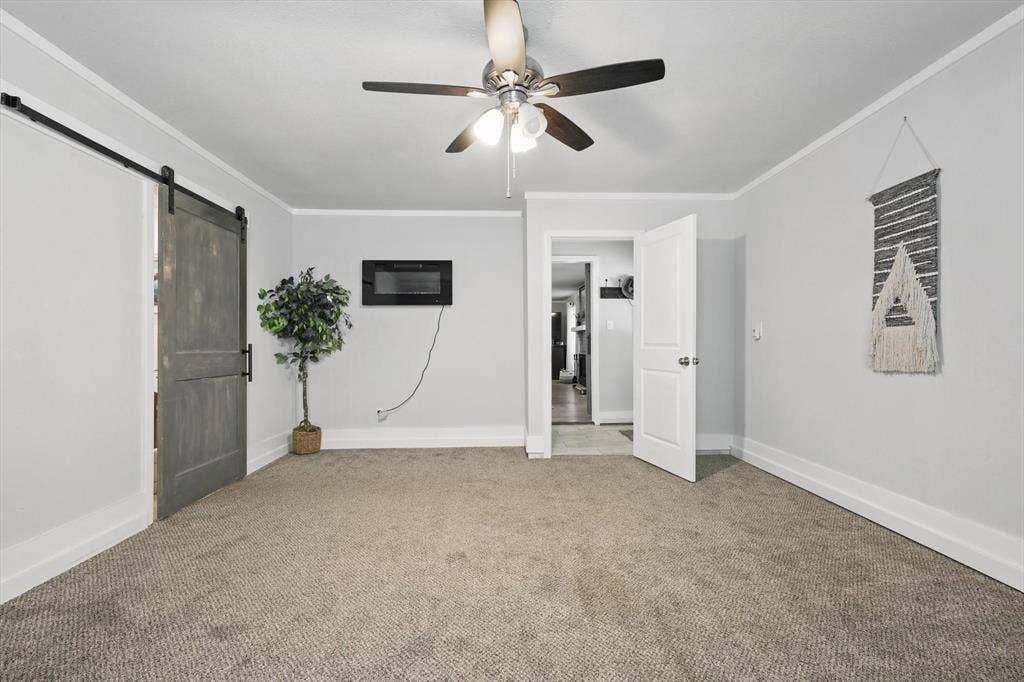 5247 Fm 1569, Farmersville, TX 75442 Neutral-toned carpet flooring, light gray wall paint, and white trim