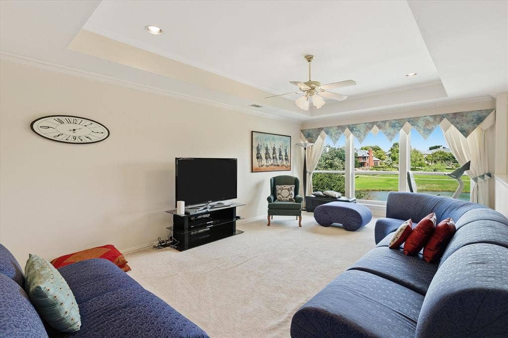 2122 Clearspring Drive N, Irving, TX 75063 Spacious upstairs game room with picturesque views of the golf course & water