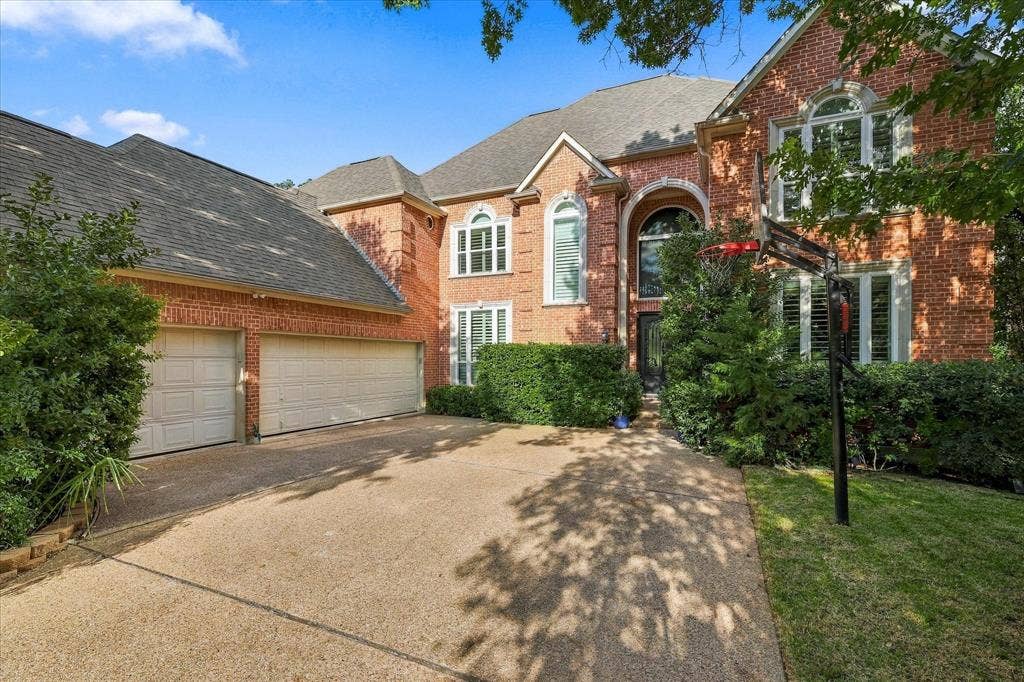 2122 Clearspring Drive N, Irving, TX 75063 Stunning brick beauty with a 3-car garage