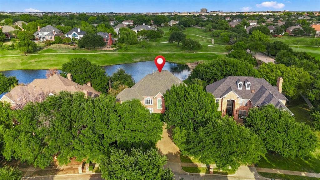 2122 Clearspring Drive N, Irving, TX 75063 Golf course lot with stunning water views!