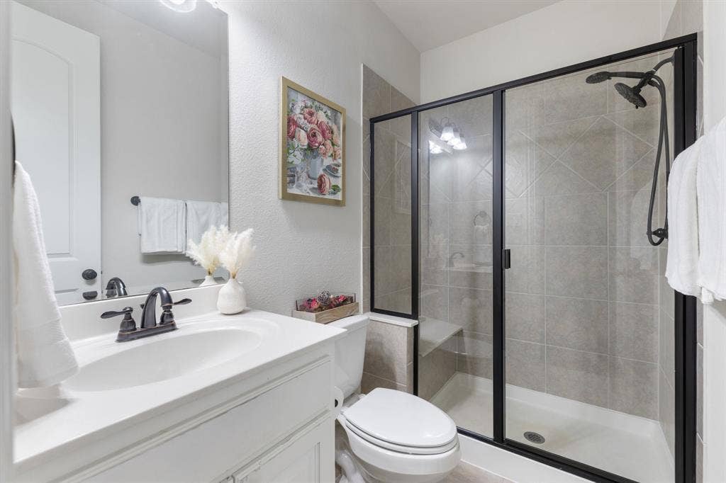 An additional full bath downstairs